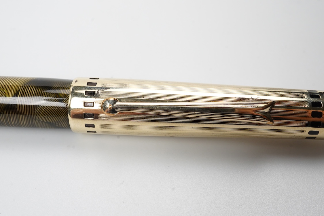 A Wahl Eversharp 'Coronet' with plastic body and gold filled cap